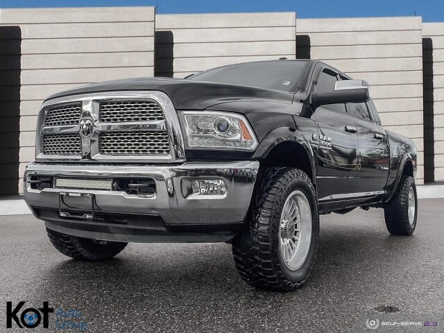 2015 Ram 3500 Laramie, Loaded and Ready, lifted with big tires, 
