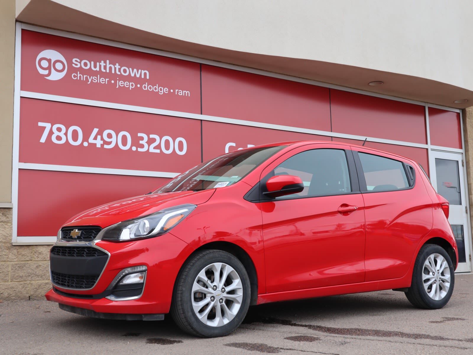 2022 Chevrolet Spark 1LT IN RED EQUIPPED WITH A FUEL EFFICIENT 1.4L I4 