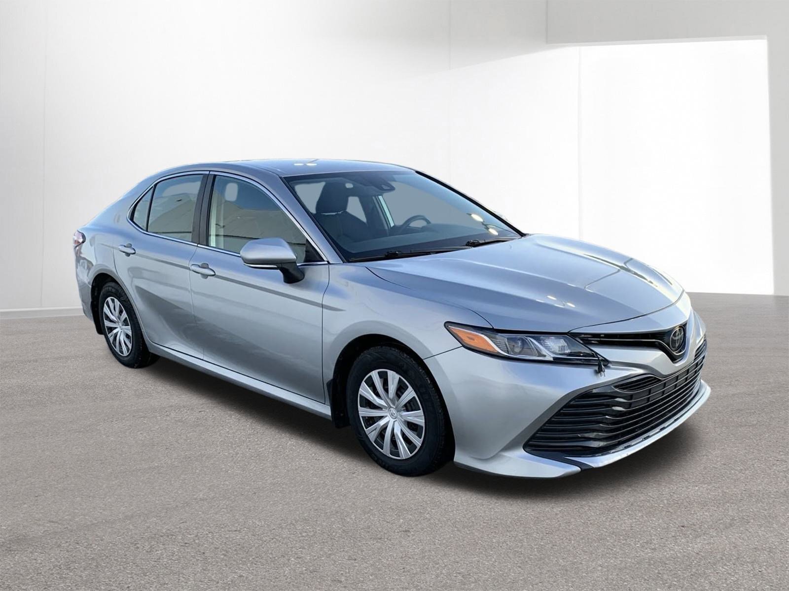 2019 Toyota Camry LE - great commuter car, gas savings!
