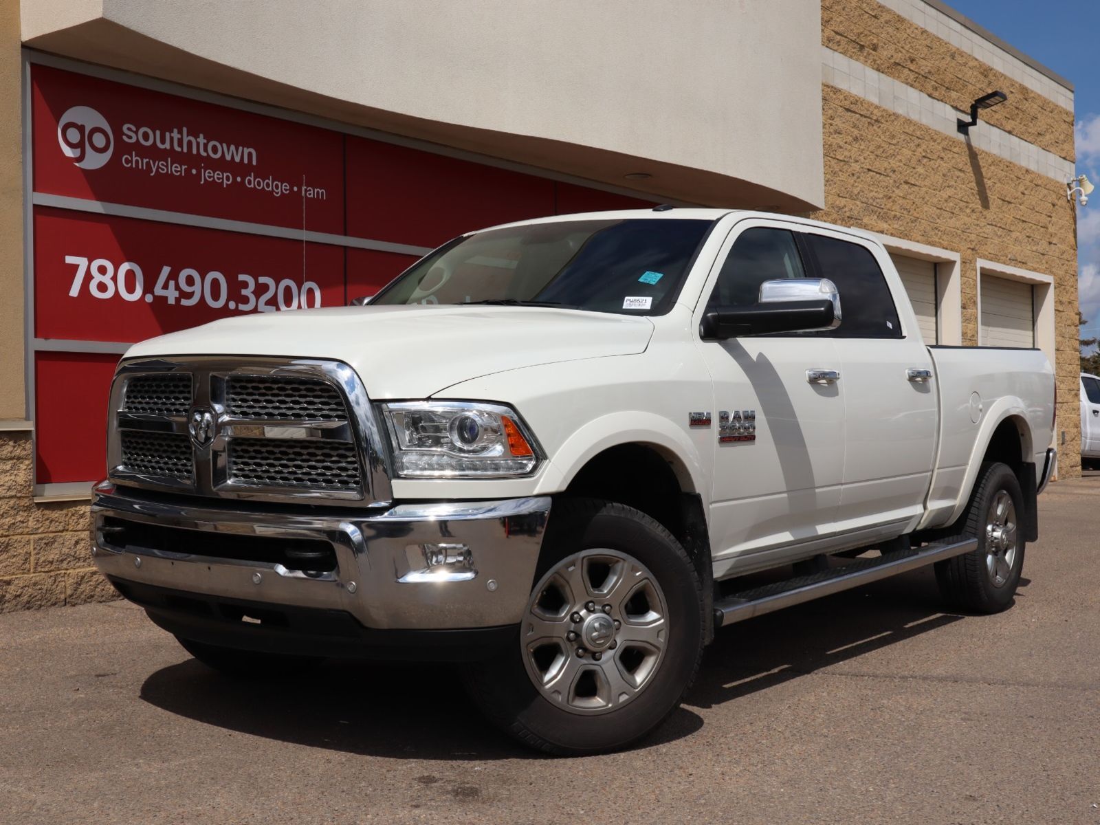 2017 Ram 2500 LARAMIE IN PEARL WHITE EQUIPPED WITH A 6.4L HEMI V