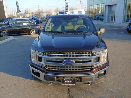 used 2018 Ford F-150 car, priced at $31,950