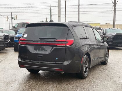 used 2024 Chrysler Pacifica Hybrid car, priced at $76,893