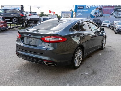 used 2016 Ford Fusion car, priced at $16,488