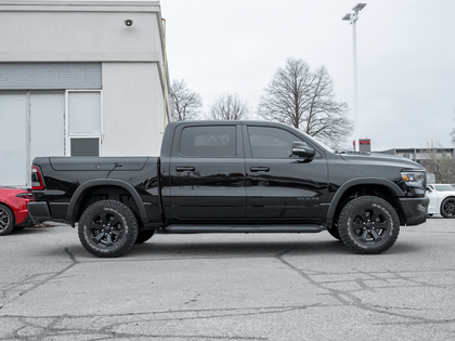 used 2021 Ram 1500 car, priced at $49,910