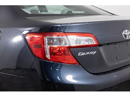 used 2014 Toyota Camry car, priced at $14,000