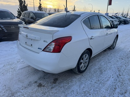 used 2014 Nissan Versa car, priced at $7,998