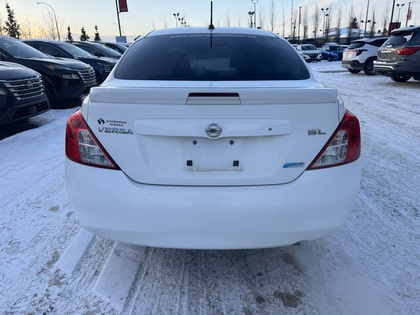 used 2014 Nissan Versa car, priced at $7,998